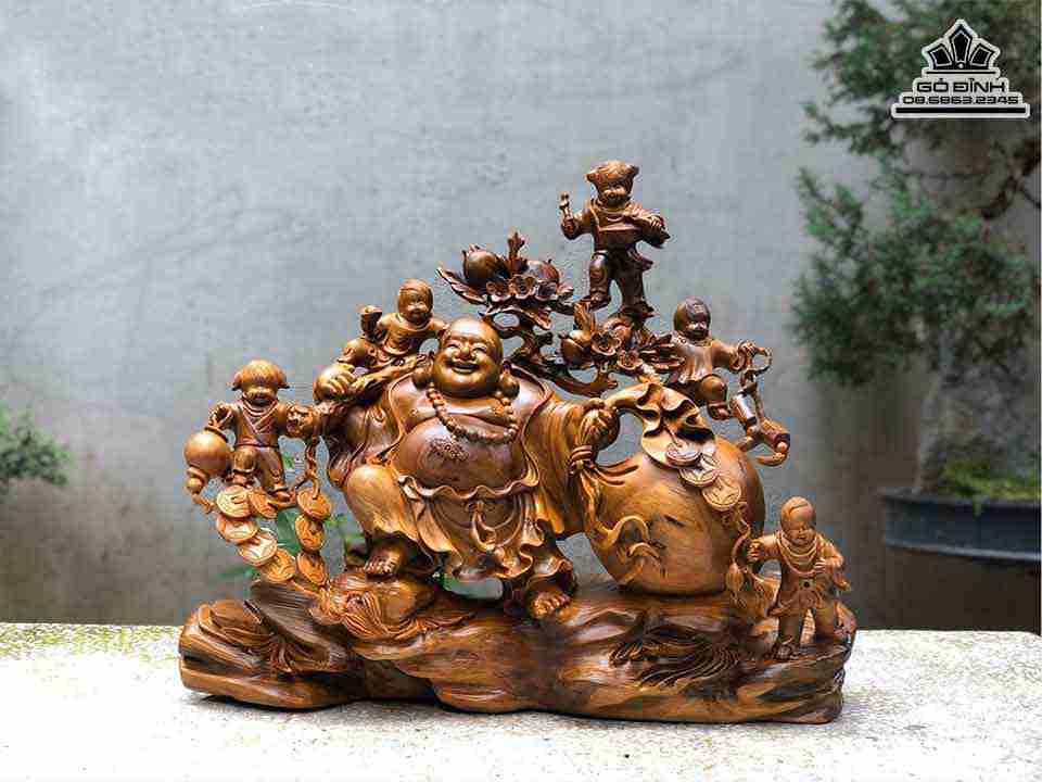 Tuong-Phat-Di-Lac-Keo-Bao-Tien-Go-Bach-Xanh