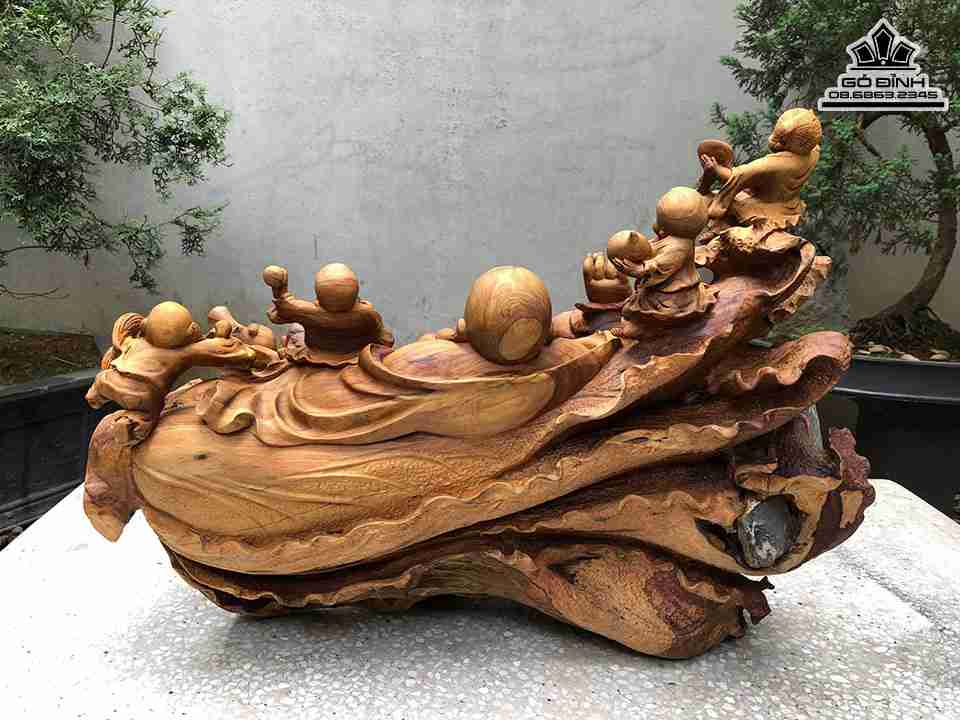 Tuong-Phat-Di-Lac-Ngoi-Bap-Cai-Go