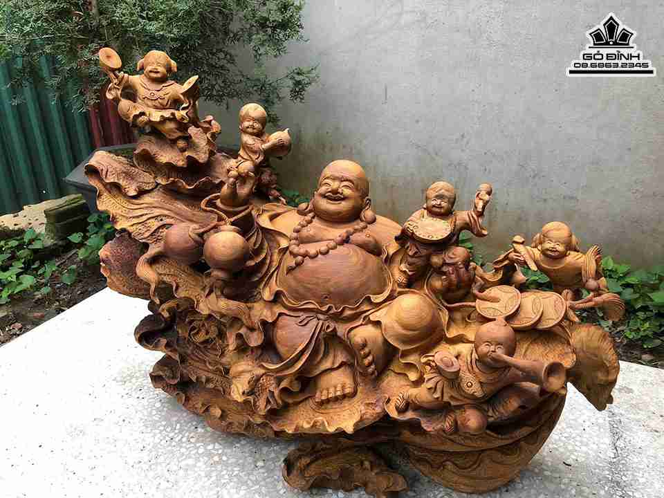 Tuong-Phat-Di-Lac-Ngoi-Bap-Cai-Go-Sun-Bach-Xanh