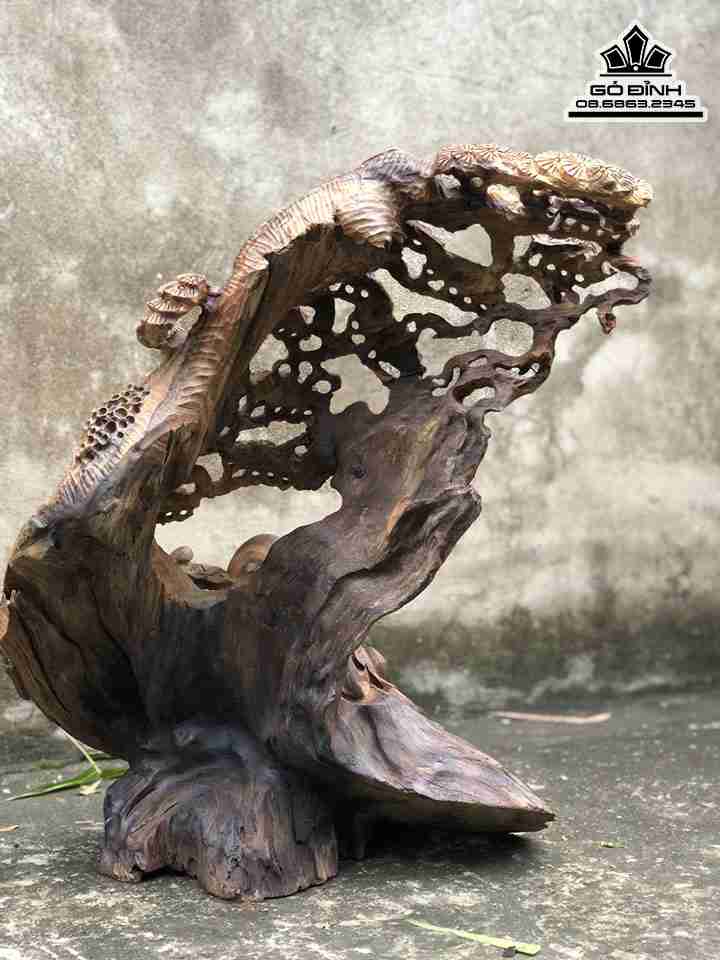 Tuong-Phat-Di-Lac-Ngoi-Goc-Tung-Go-Bach-Xanh