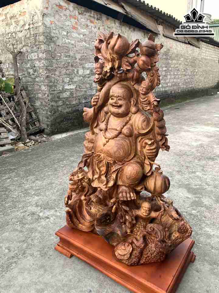 Tuong-phat-Di-Lac-Vac-Canh-Dao-Go-Cam-Long-Chuot-