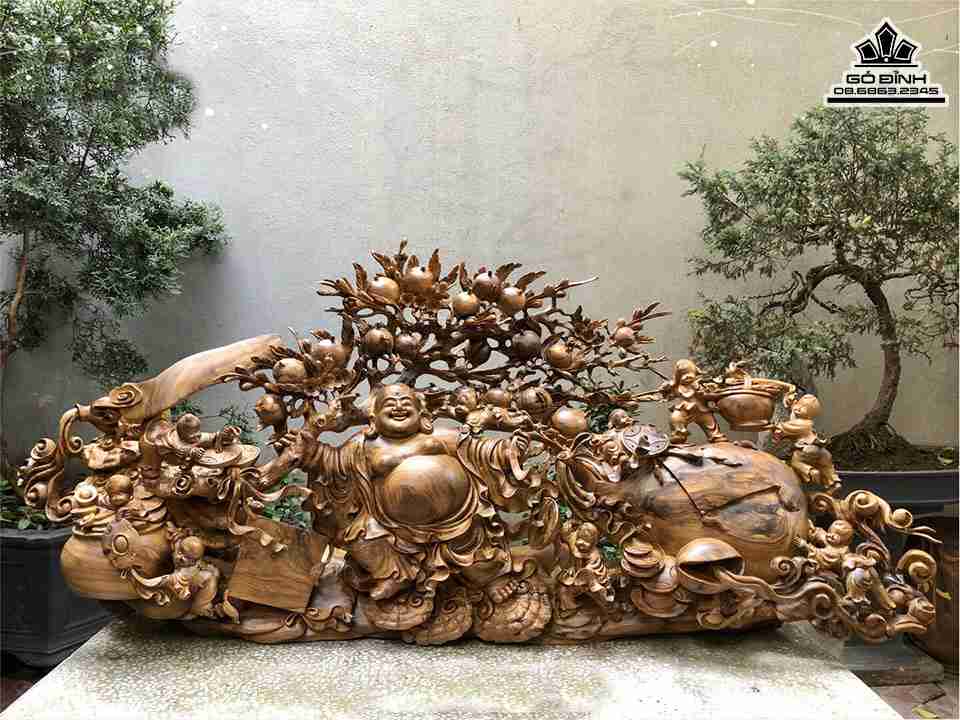 Tuong-Phat-Di-Lac-Keo-Bao-Tien-Go-Bach-Xanh