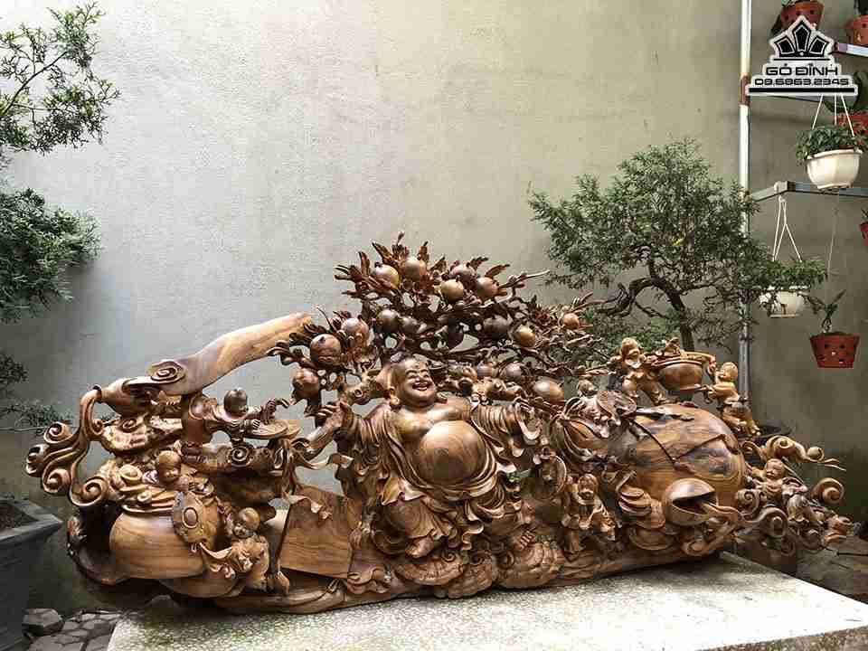 Tuong-Phat-Di-Lac-Keo-Bao-Tien-Go-Bach-Xanh