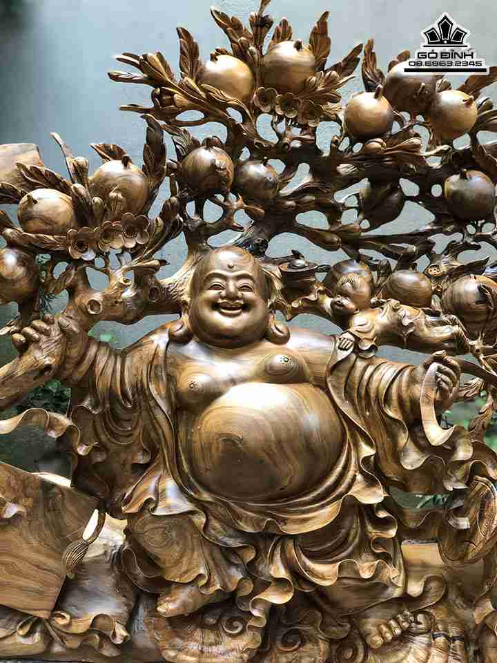 Tuong-Phat-Di-Lac-Keo-Bao-Tien-Go-Bach-Xanh