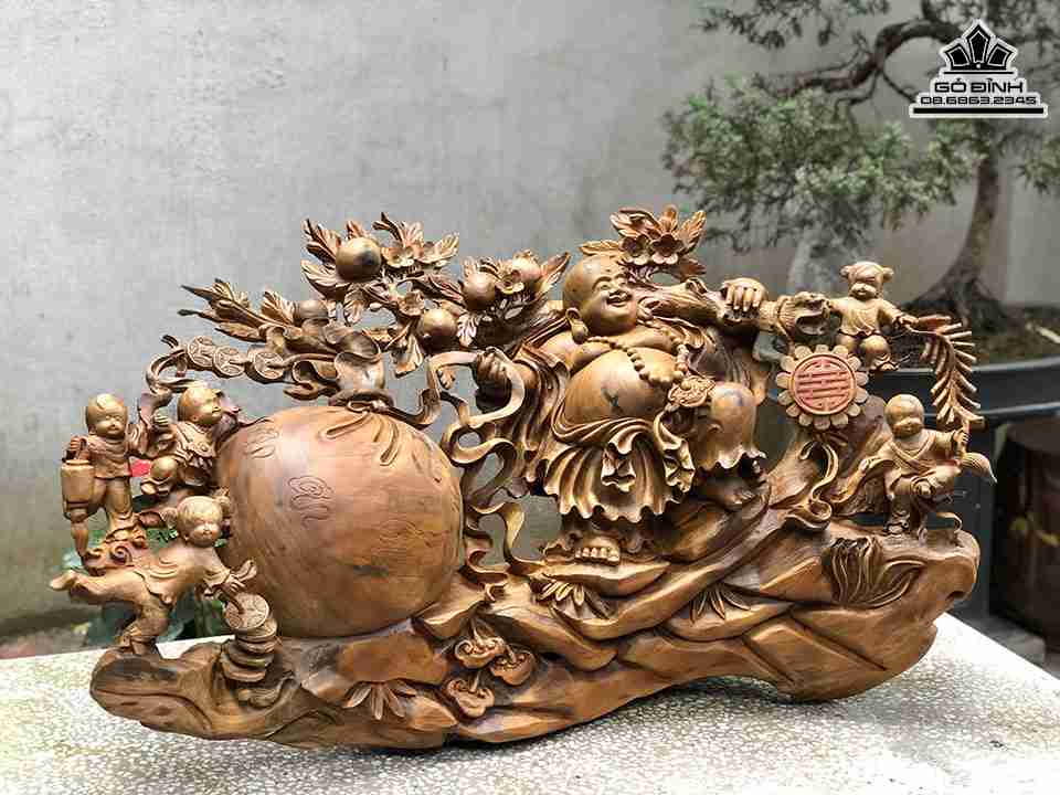 Tuong-Phat-Di-Lac-Keo-Bao-Tien-Go-Bach-Xanh