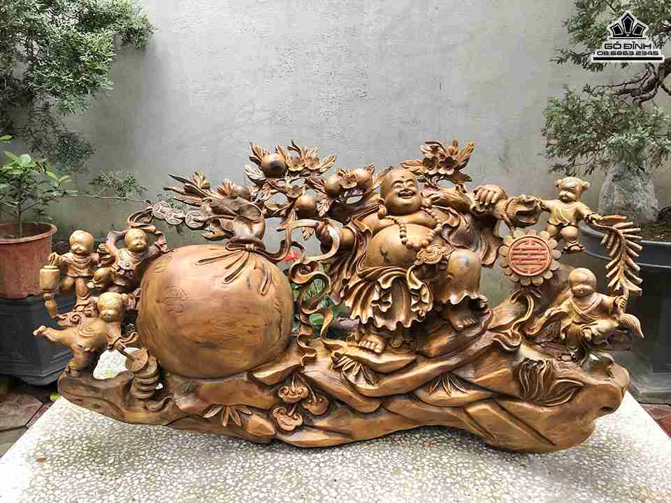 Tuong-Phat-Di-Lac-Keo-Bao-Tien-Go-Bach-Xanh-1