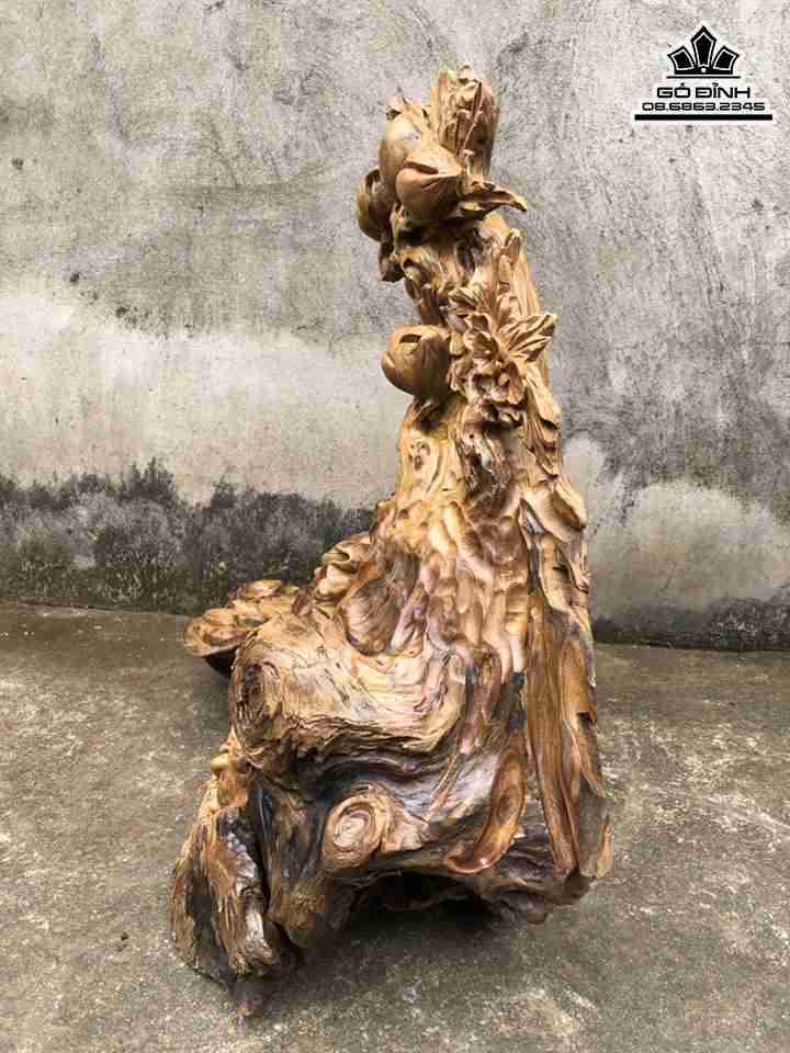 Tuong-Phat-Di-Lac-Ngoi-Goc-Dao-Go-Bach-Xanh