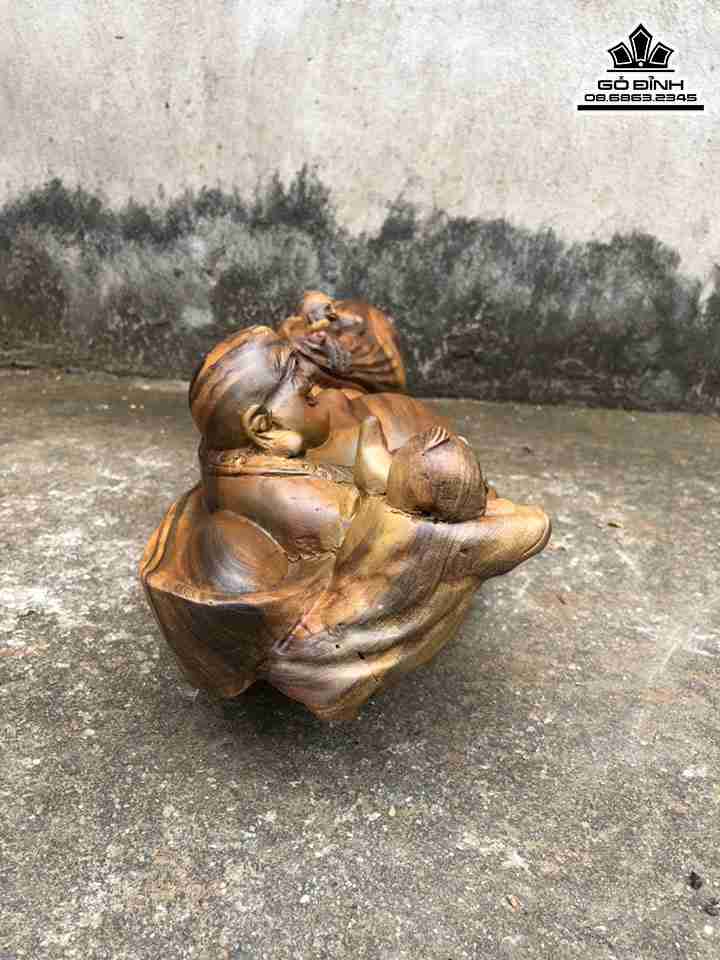 Tuong-Phat-Di-Lac-Keo-Bao-Tien-Go-Bach-Xanh