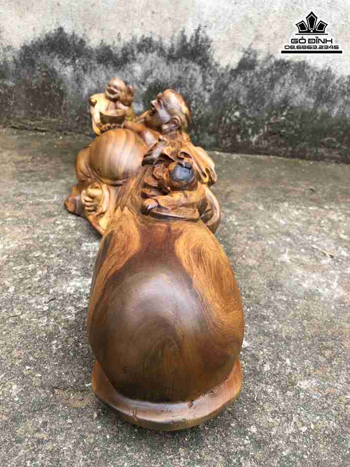 Tuong-Phat-Di-Lac-Keo-Bao-Tien-Go-Bach-Xanh