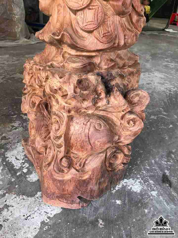 Phật di lặc cưỡi cá gỗ hương cao 102 rộng 38 dày 32 (cm)2