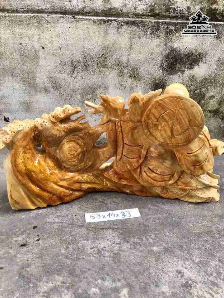 Phật di lặc kéo bao tiền gỗ nu nghiến  3