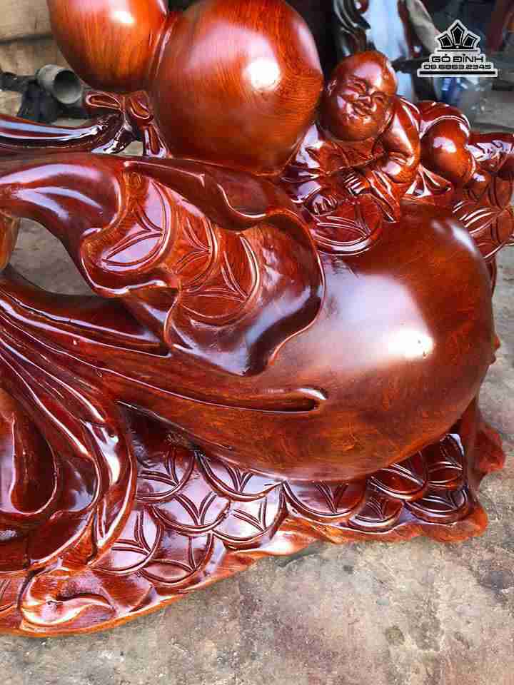 Phật di lặc kéo bao tiền gỗ hương  4