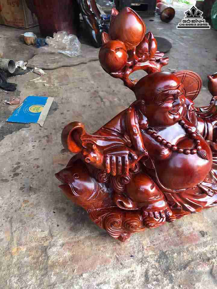 Phật di lặc kéo bao tiền gỗ hương  5