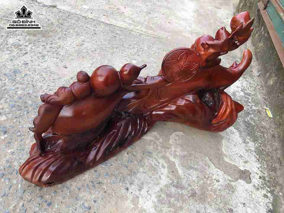 Phật di lặc kéo bao tiền gỗ hương  6