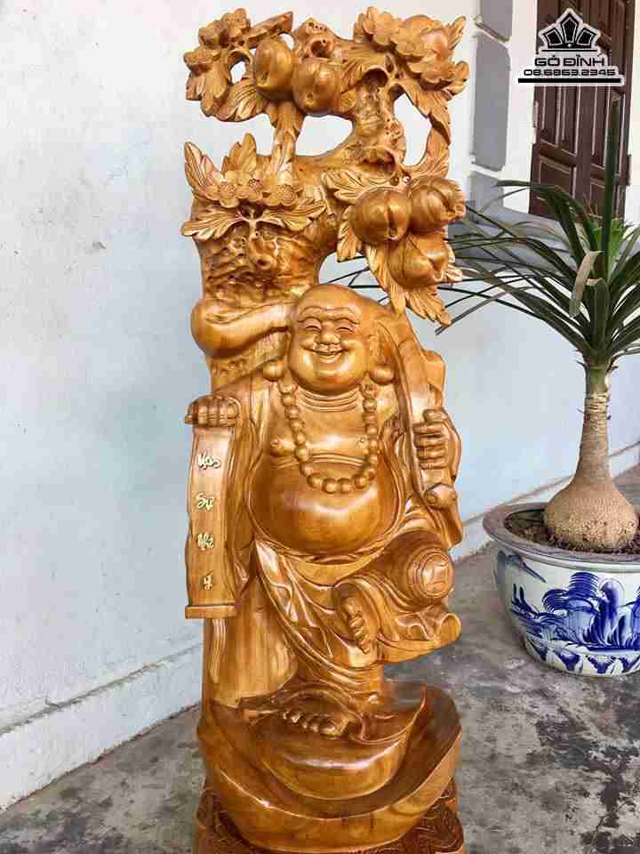 Phật di lặc vác cành đào gỗ xá xị thơm  1