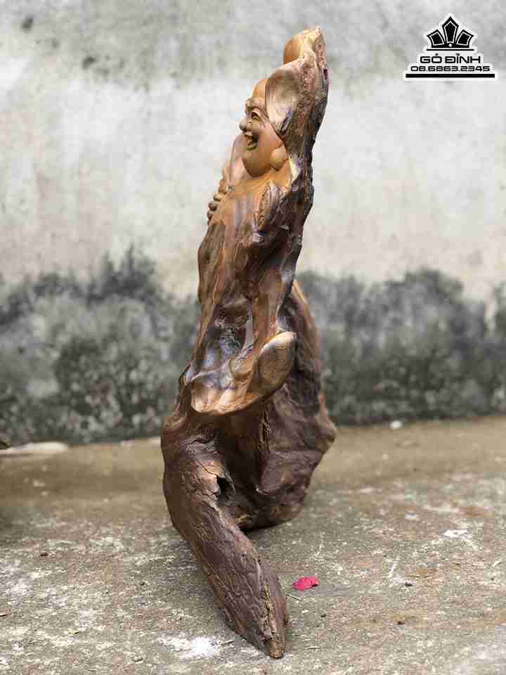 Tuong-Phat-Di-Lac-Cam-Bao-Tien-Go-Bach-Xanh