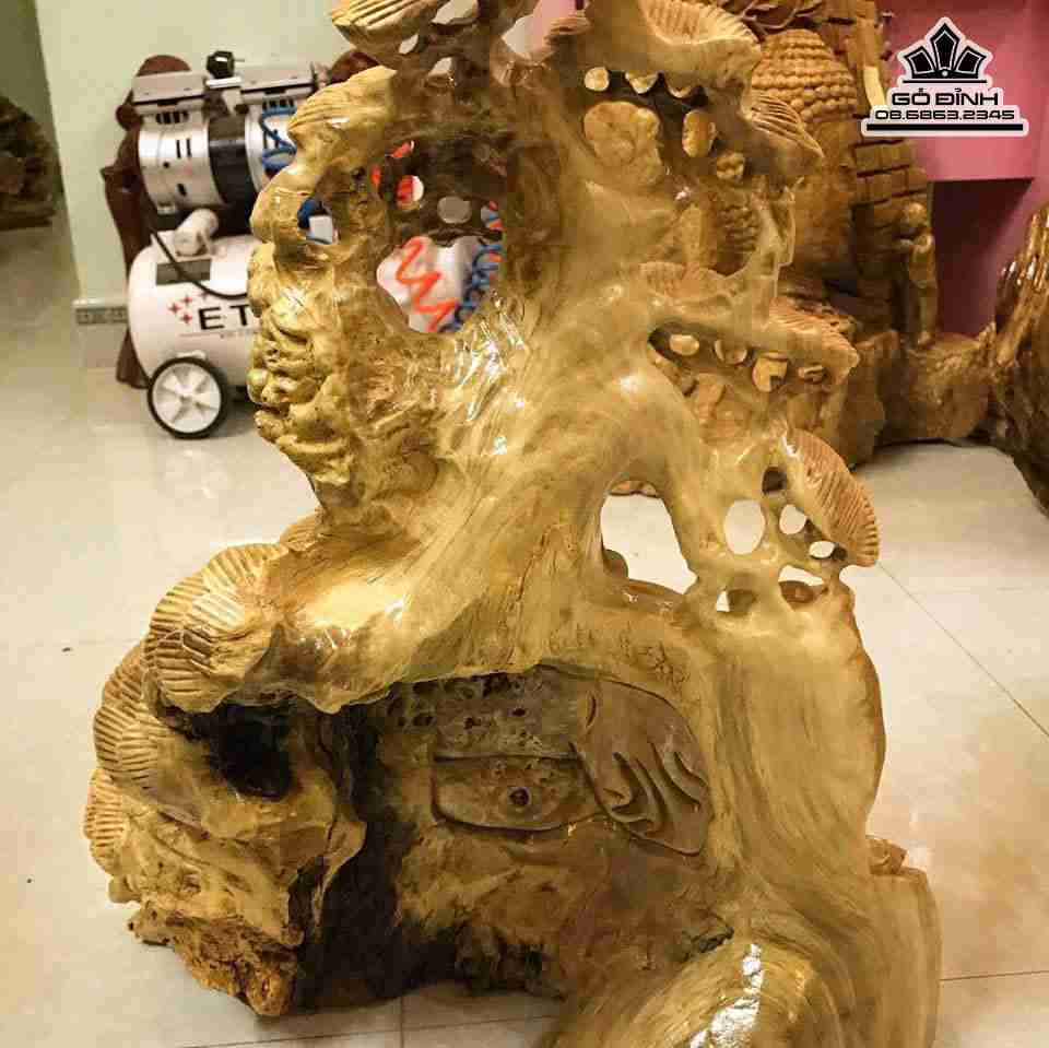 Phat-di-lac-ngoi-goc-tung-go-nu-nghien-cao-55-rong-48-day-18-cm