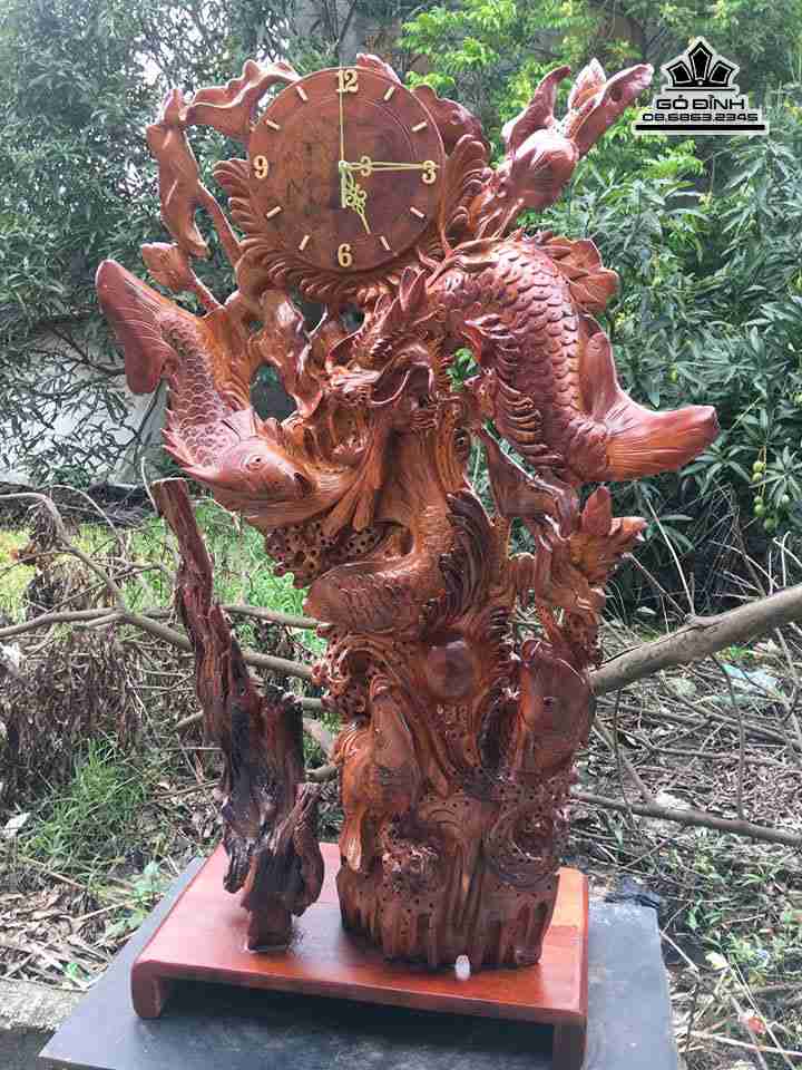 Dong-ho-ca-chep-hoa-rong-go-huong-cao-99-rong-60-day-27-cm