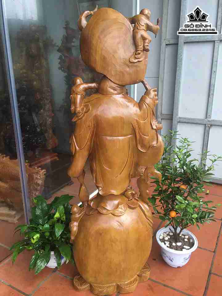 Tuong-Phat-Di-Lac-Dung-Cam-Quat-Go-Xa-Xi