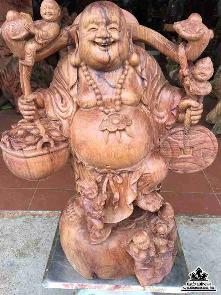 tuong-Phat-di-lac-ganh-tien-go-cam-cao-73-rong-56-sau-30-cm