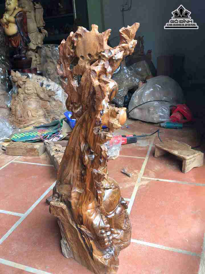 Phat-di-lac-ngoi-goc-dao-go-bach-xanh2