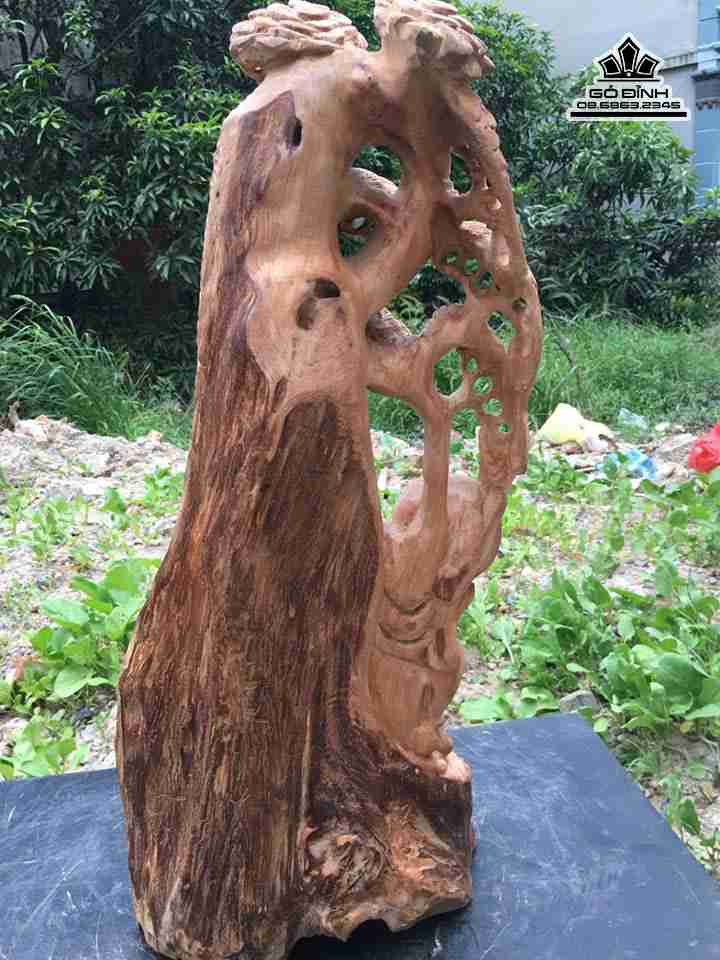 Phat-di-lac-ngoi-goc-tung-go-ngoc-am-cao-68-rong-30-day-28-cm