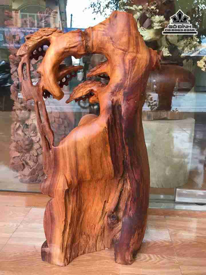 Phat-di-lac-ngoi-goc-tung-go-huong-cao-62-rong-32-day-22-cm