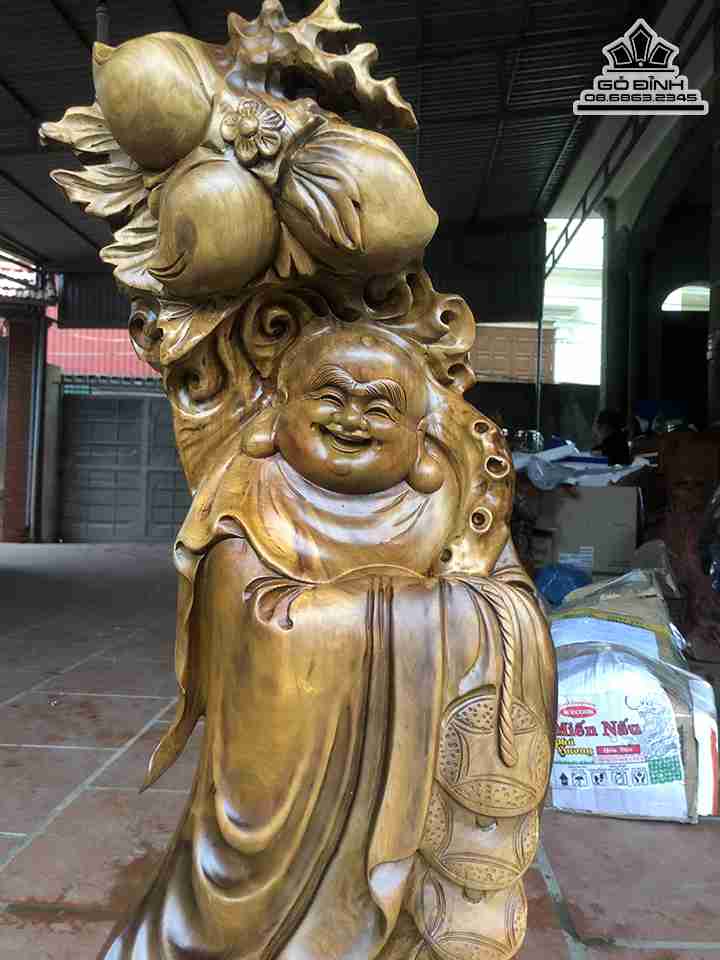 Tuong-Phat-Di-Lac-Cuoi-Ca-Chep-Go-Bach-Xanh