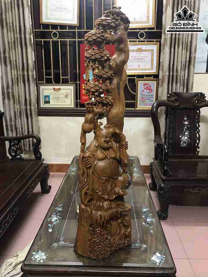 Tuong-Phat-Di-Lac-Dung-Goc-Tung-Go-Bach-Xanh