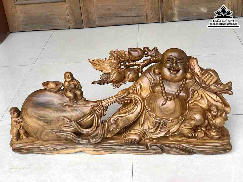 Tuong-Phat-Di-Lac-Keo-Bao-Tien-Go-Bach-Xanh