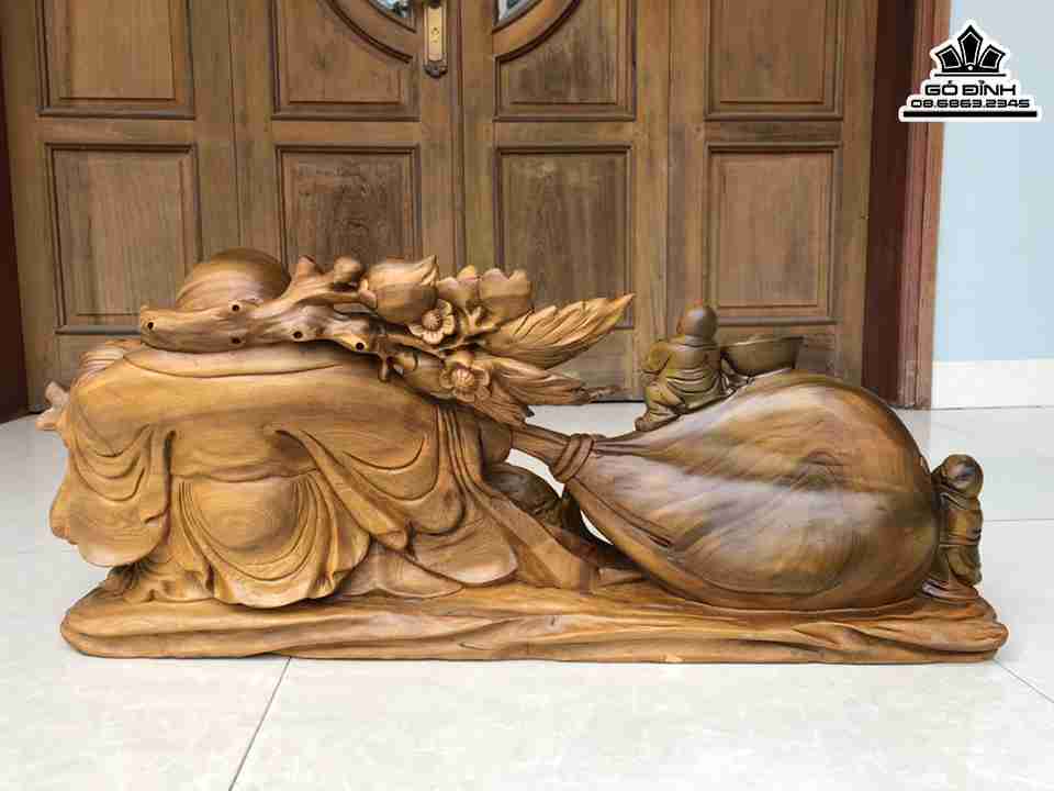 Tuong-Phat-Di-Lac-Keo-Bao-Tien-Go-Bach-Xanh