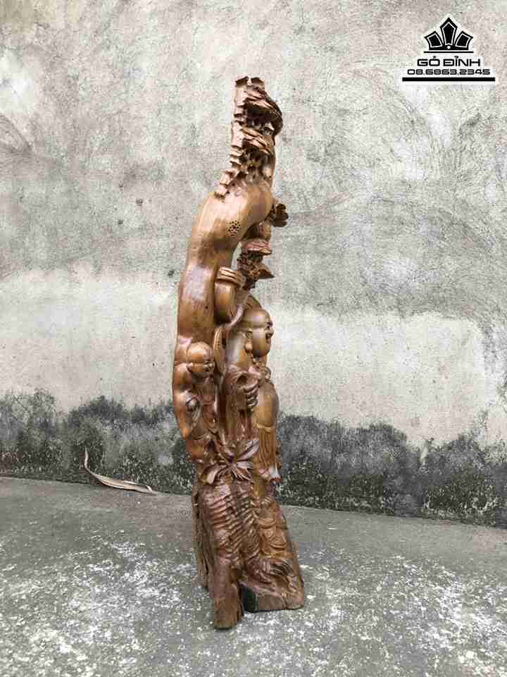 Tuong-Phat-Di-Lac-Dung-Goc-Tung-Go-Bach-Xanh