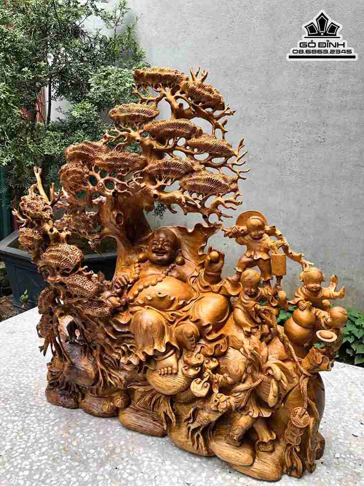 Tuong-Phat-Di-Lac-Ngoi-Goc-Tung-Go-Bach-Xanh