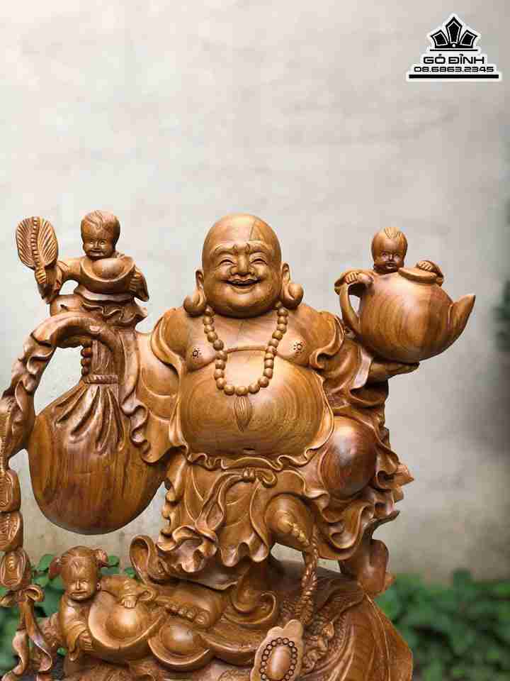 Tuong-Phat-Di-Lac-Dung-Bap-Cai-Go-Bach-Xanh