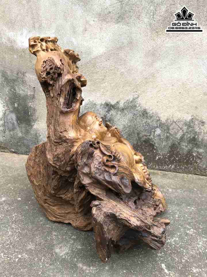 Tuong-Phat-Di-Lac-Ngoi-Goc-Tung-Go-Bach-Xanh