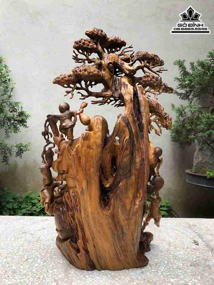 Tuong-Phat-Di-Lac-Hoan-Hy-Ngoi-Goc-Tung-Go-Bach-Xanh