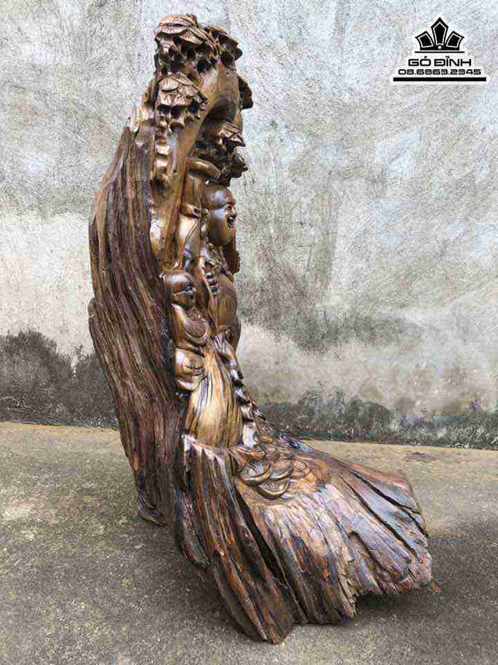 Tuong-Phat-Di-Lac-Dung-Goc-Tung-Go-Bach-Xanh