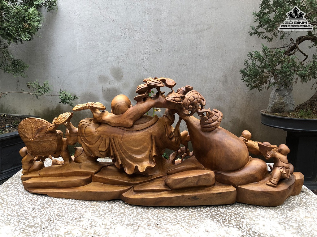 Tượng Phật Di Lặc Kéo Bao Tiền Gỗ Xá Xị (Gù Hương) Cao 45 Ngang 110 Sâu 26 (cm) 2
