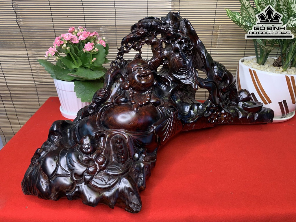 Tượng Phật Di Lặc Ngự Gốc Tùng Gỗ Trắc Cao 27 Ngang 54 Sâu 20 (cm) 0