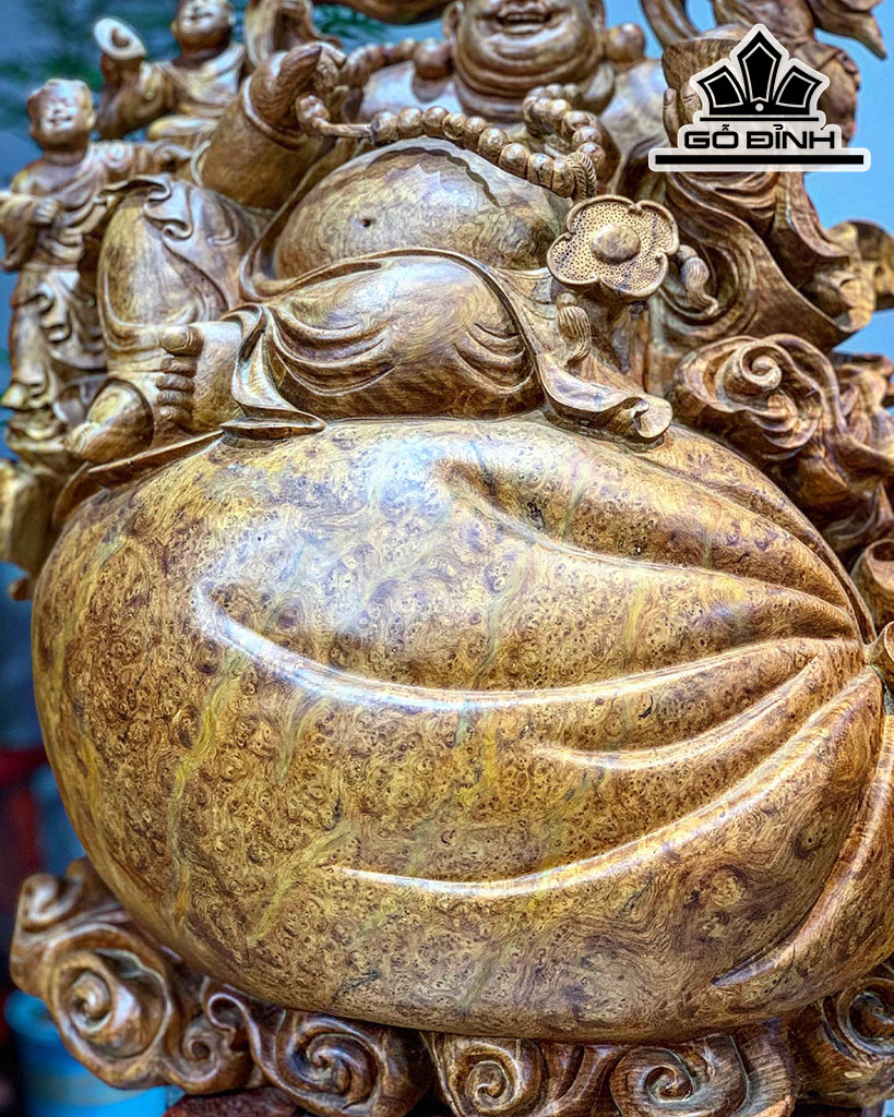 Tượng Phật Di Lặc Ngồi Bao Tiền Gỗ Nu Hương Ngang 58 Cao 60 Sâu 27 (cm)