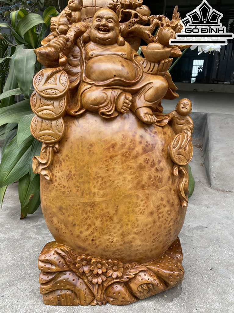 Tượng Phật Di Lặc Ngồi Vác Cành Đào Gỗ Nu Xá Xị Cao 70 Ngang 37 Sâu 16 (cm)