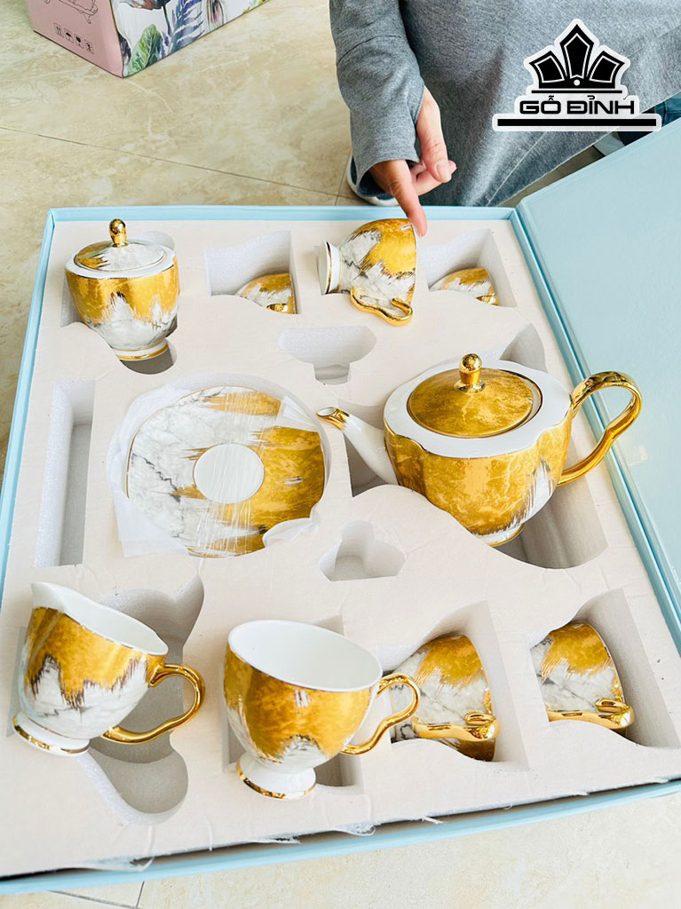 Bộ Ấm Chén Vàng Trắng Gốm Tàu