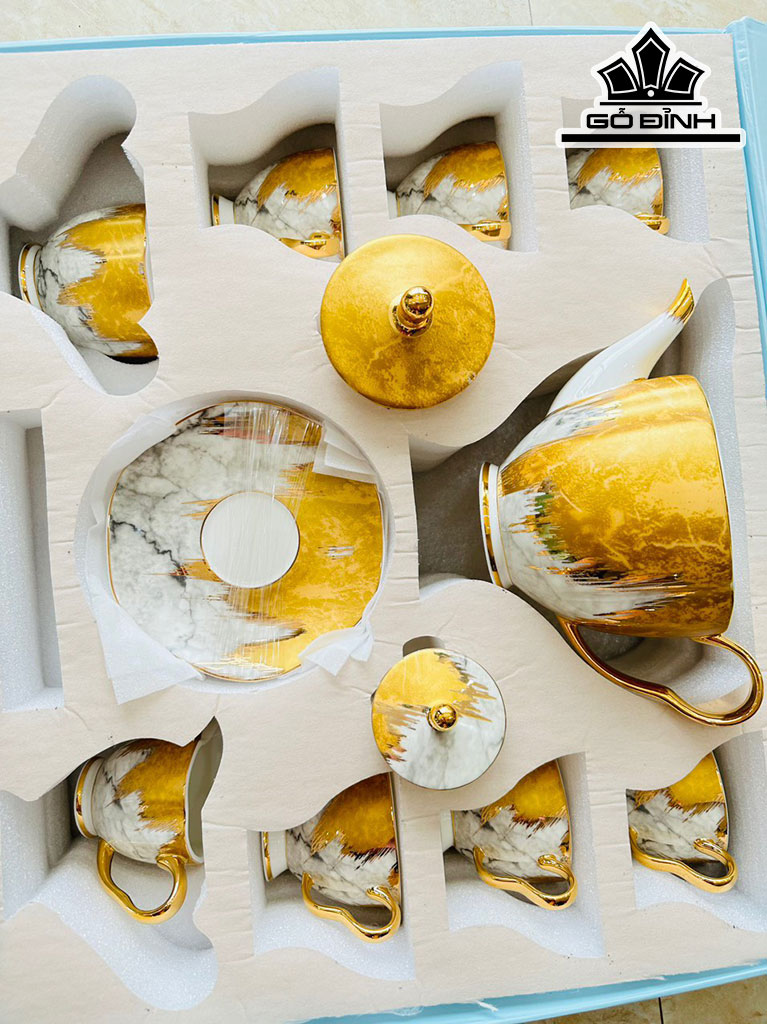 Bộ Ấm Chén Vàng Trắng Gốm Tàu