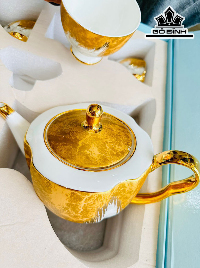 Bộ Ấm Chén Vàng Trắng Gốm Tàu