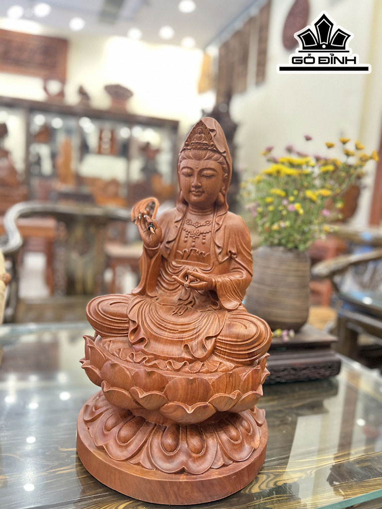 tuong-phat-ba-quan-the-am-ngoi-dai-sen-go-huong-cao-48-ngang-28-sau-28-cm-423069