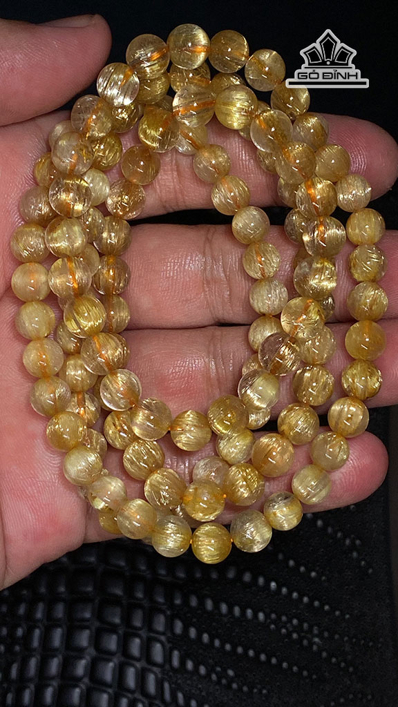 chuoi-da-thach-anh-toc-vang-duong-kinh-7-mm-61g-448110