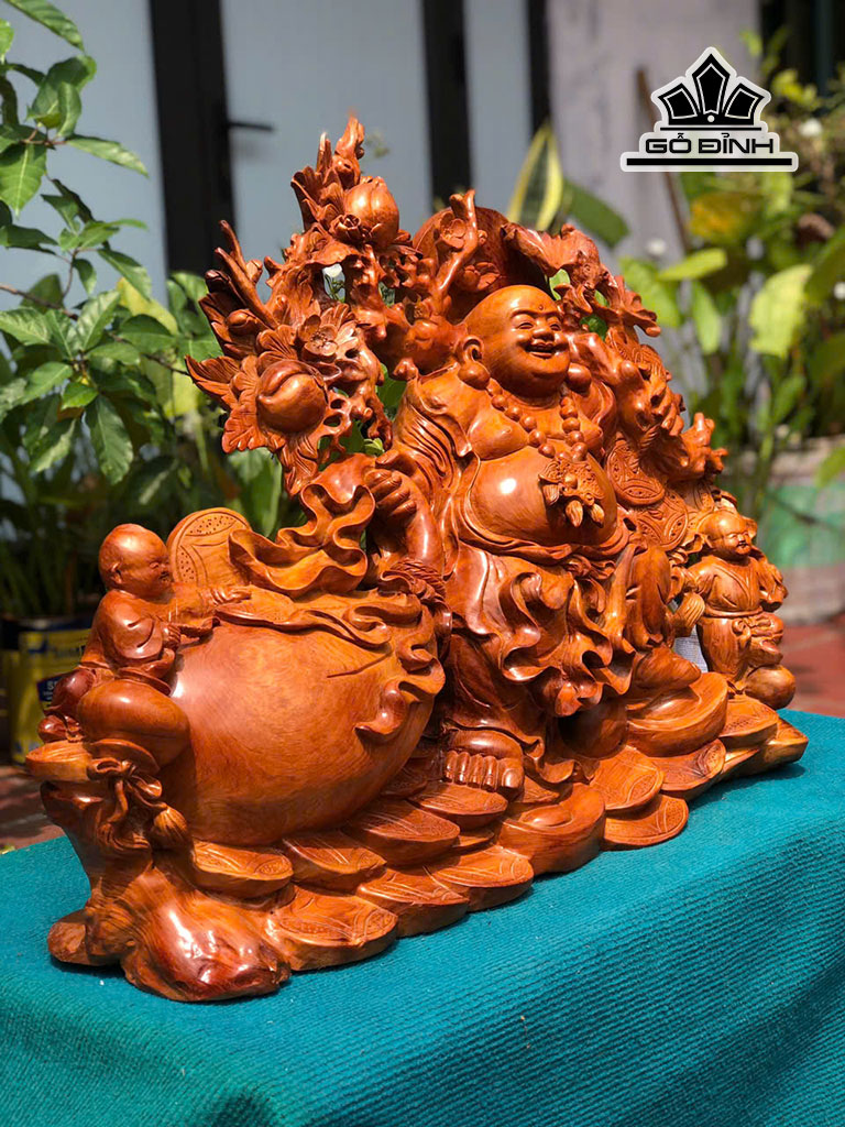 tuong-phat-di-lac-nhi-phuc-keo-bao-tien-go-huong-cao-55-ngang-70-sau-19-cm-453181