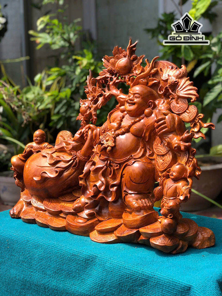 tuong-phat-di-lac-nhi-phuc-keo-bao-tien-go-huong-cao-55-ngang-70-sau-19-cm-453182