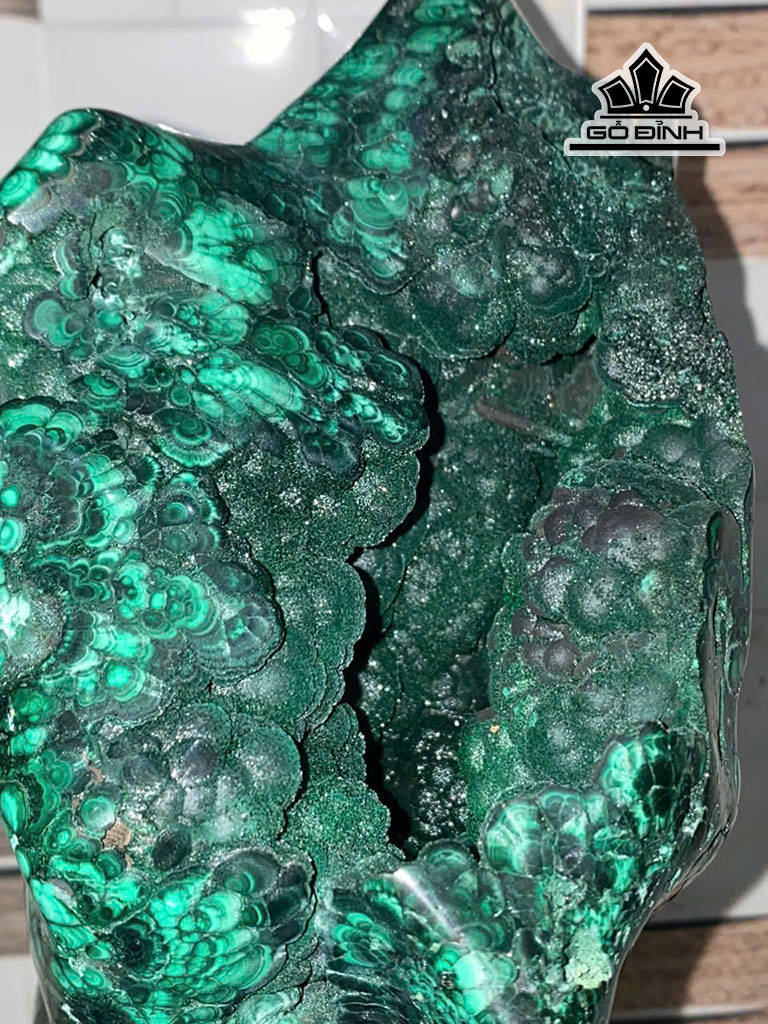 tac-pham-da-malachite-cao-33-cm-7kg-461256