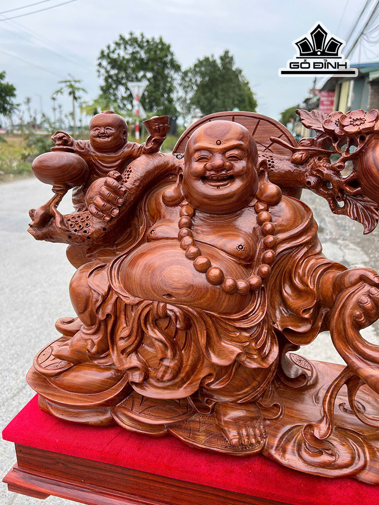 tuong-phat-di-lac-keo-bao-tien-go-cam-cao-36-ngang-61-sau-18-cm-ky-cao-10-cm-461314